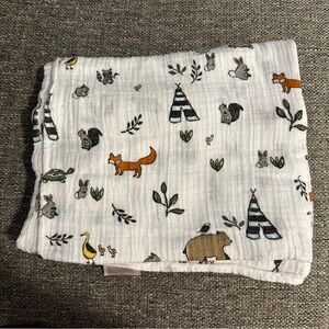 little unicorn cotton swaddle blanket - forest animals